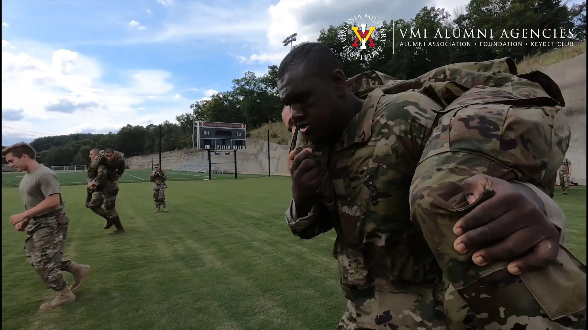 two cadets practicing a buddy carry
