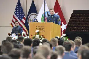 Bryson Minear ’24, Ring Figure Committee president provides opening remarks as Cole Cathcart ’24, general committee president, looks on at the Ring Figure Presentation in Cameron Hall.