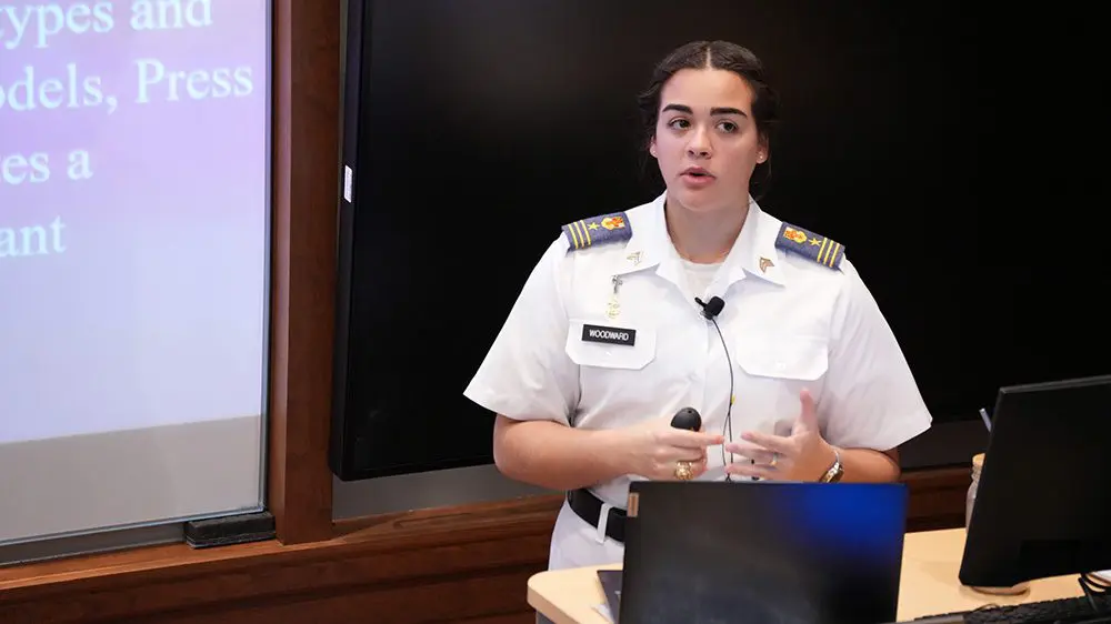 Cadet Gabriele Woodward ’24 making her honors presentation.