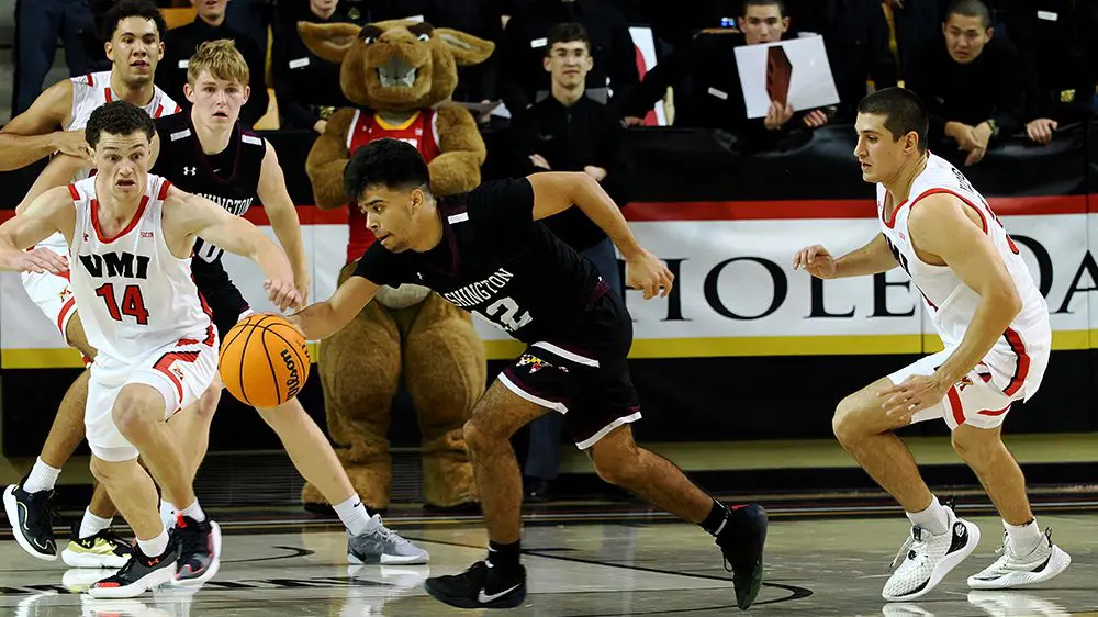 basketball player dribbling ball