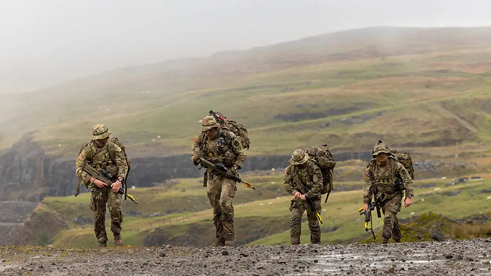 Army ROTC cadets from the Virginia Military Institute exit the CBRN stand at Exercise Cambrian Patrol