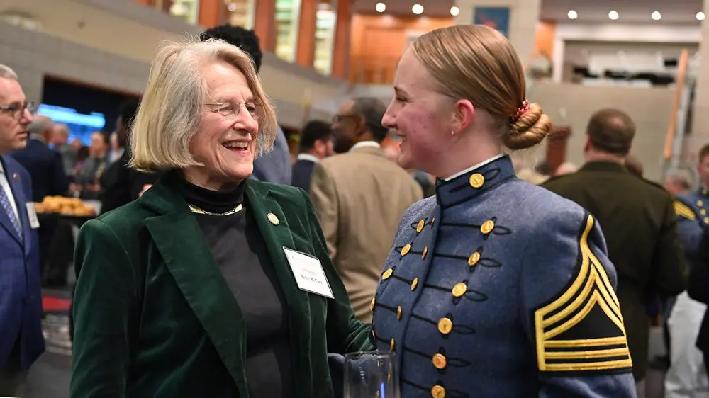 female cadet speaking with female donor