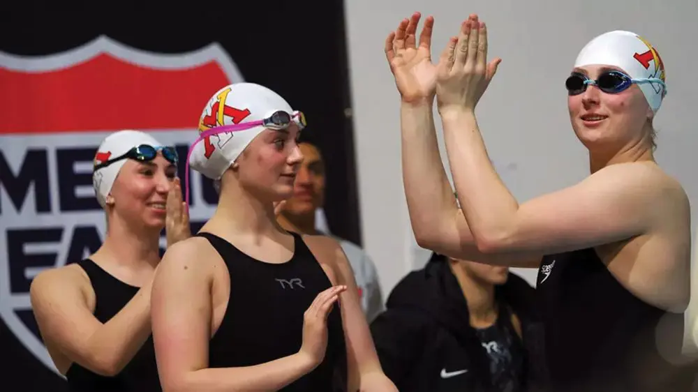 swimmers cheering