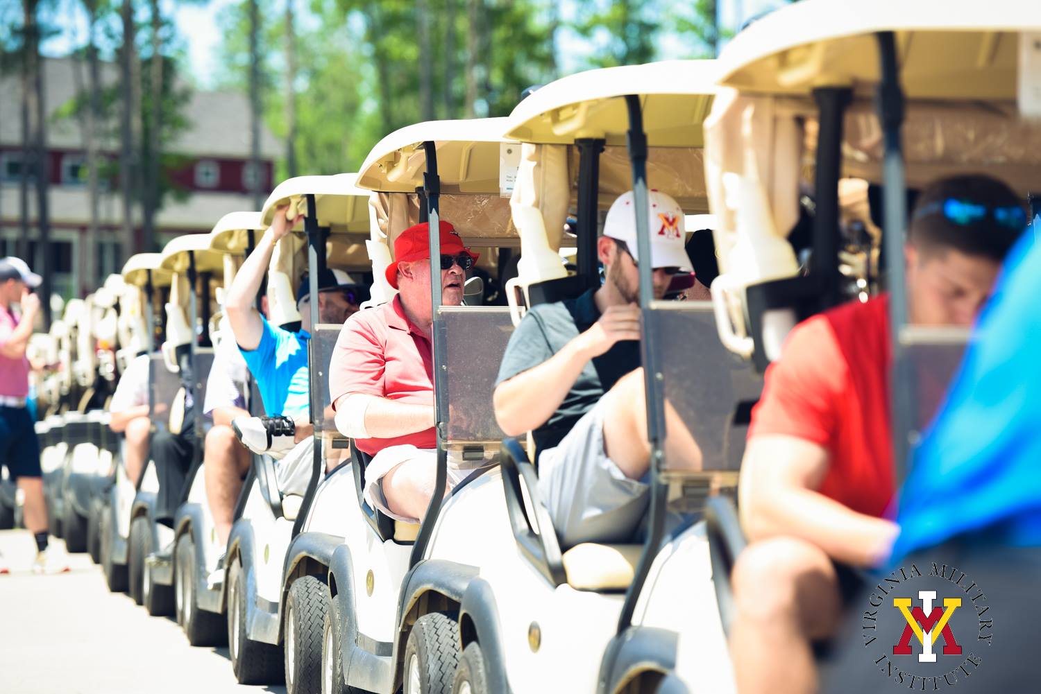 vmi alumni in gold carts