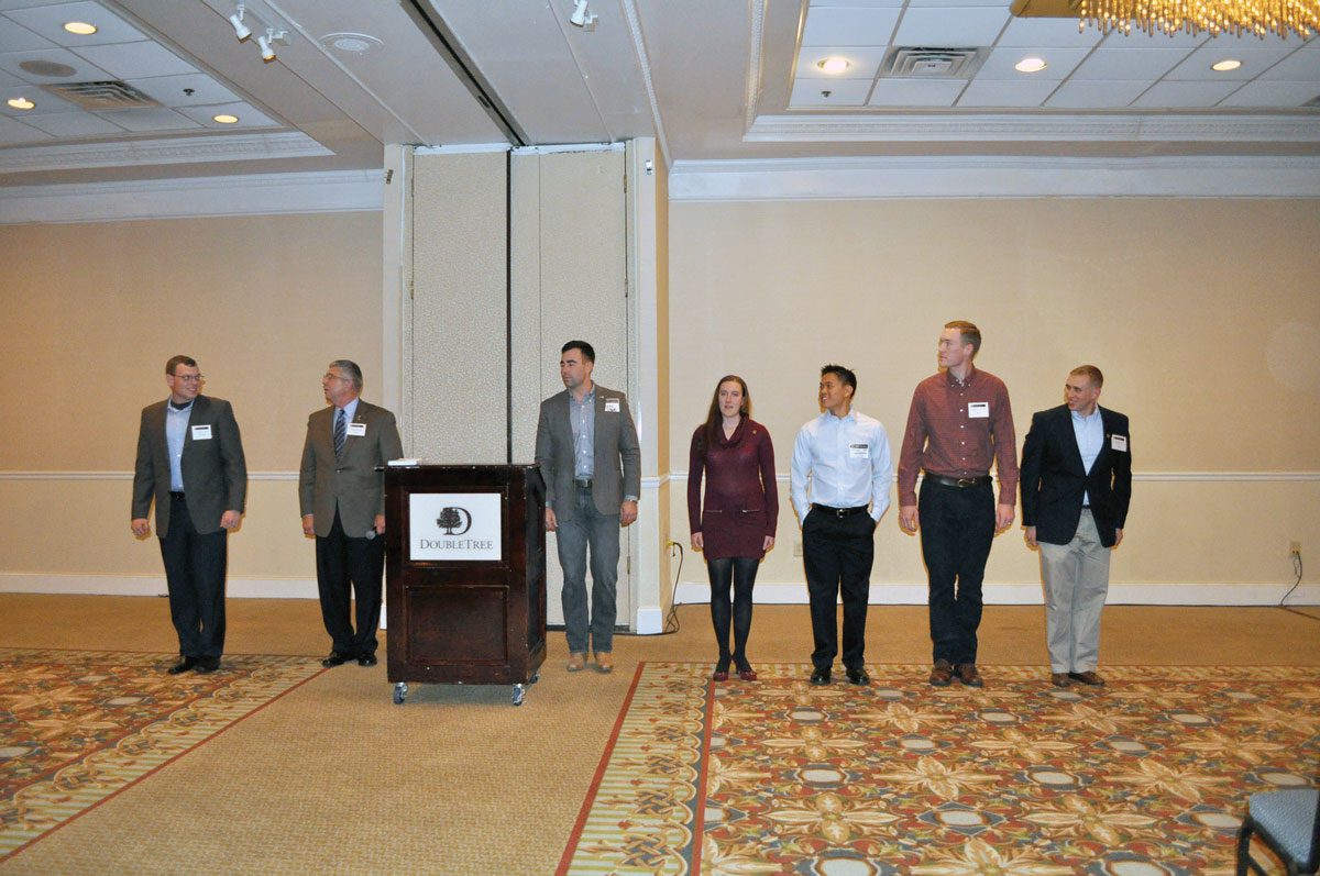 Fayetteville alumni standing at event