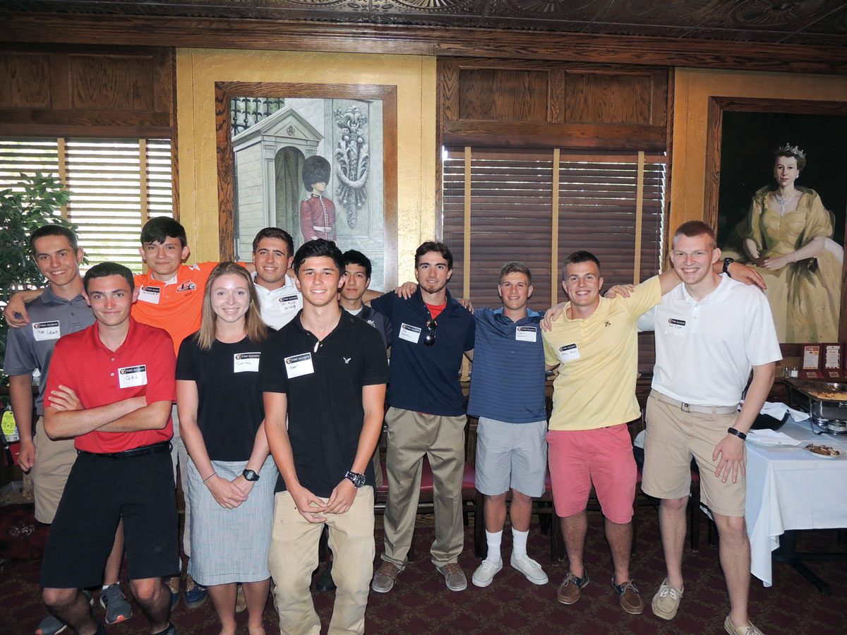 Alumni standing at Maryland chapter event