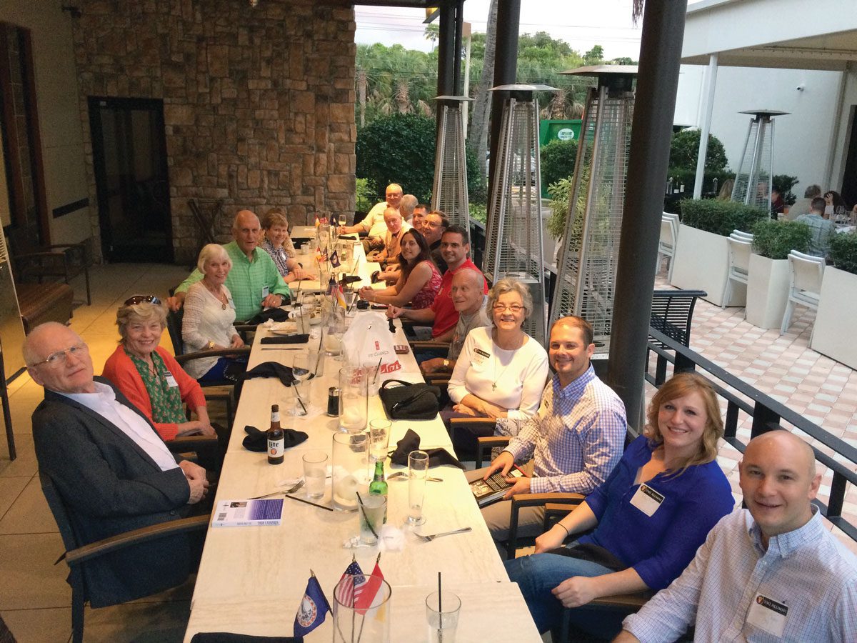 Southern Florida Alumni sitting at table