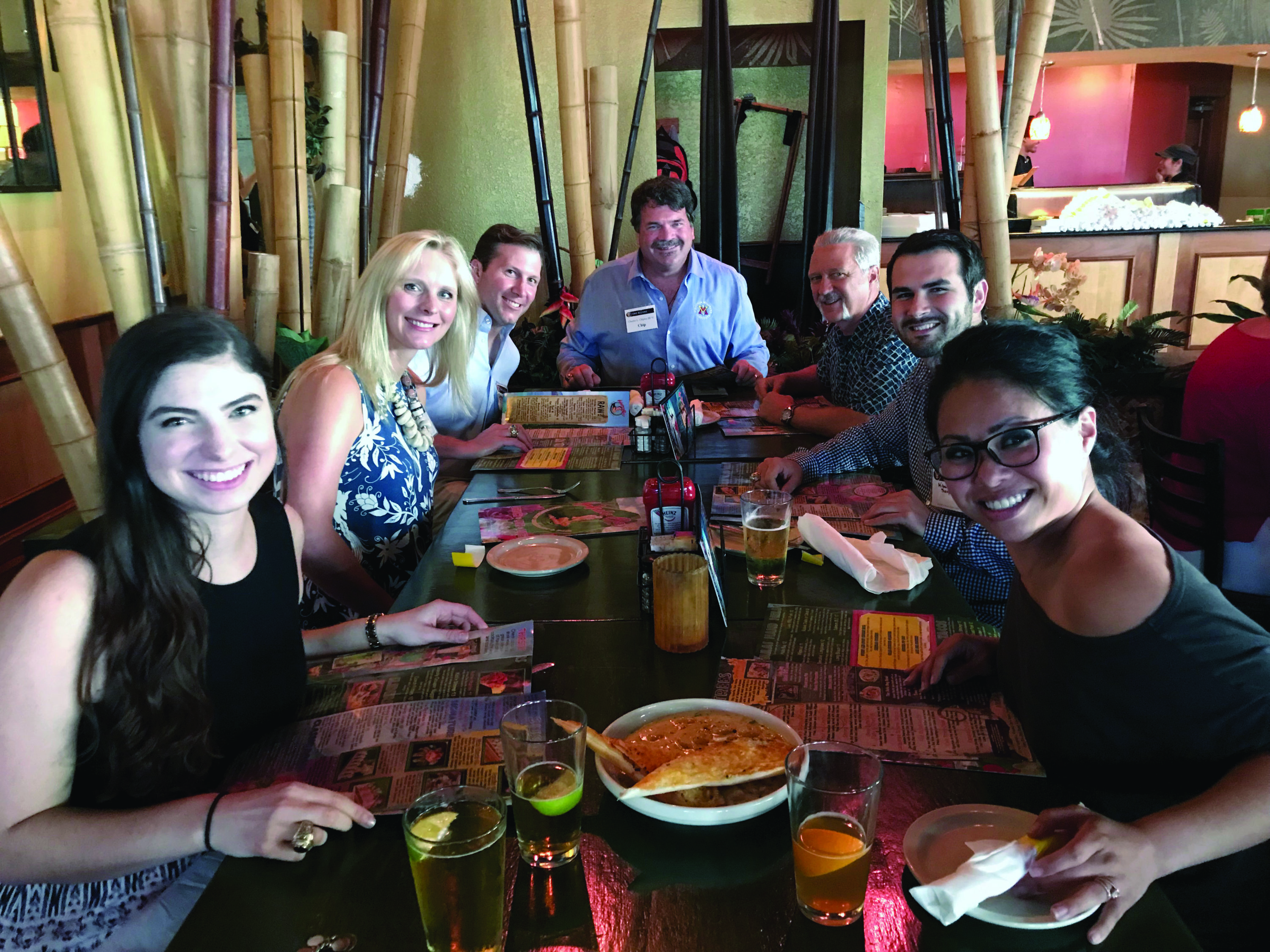 Tampa chapter alumni at dinner table