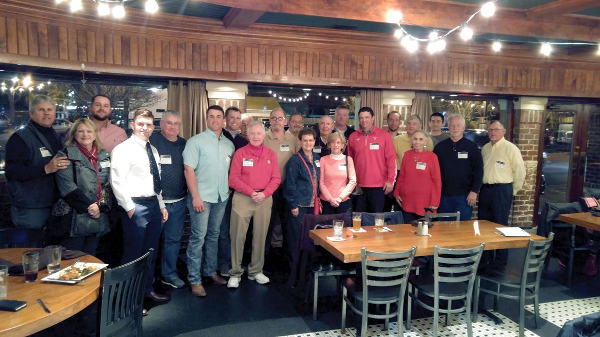 Wilmington Chapter alumni standing at Baseball dinner