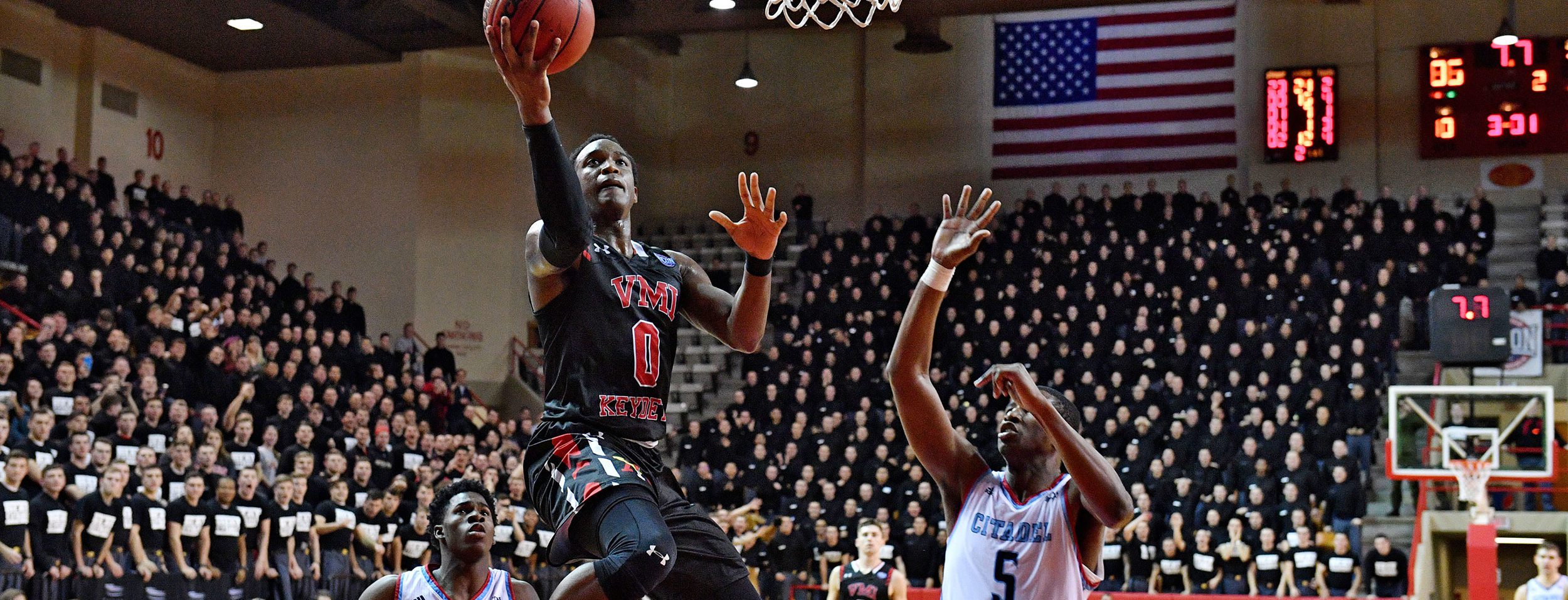 VMI athlete going for a lay-up