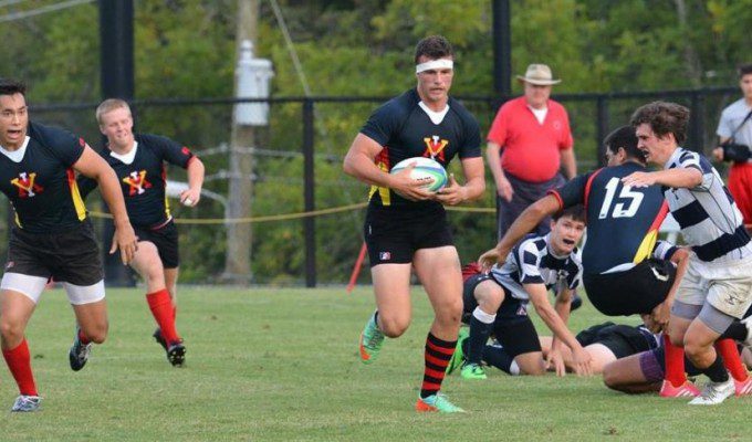 VMI Rugby player running with ball