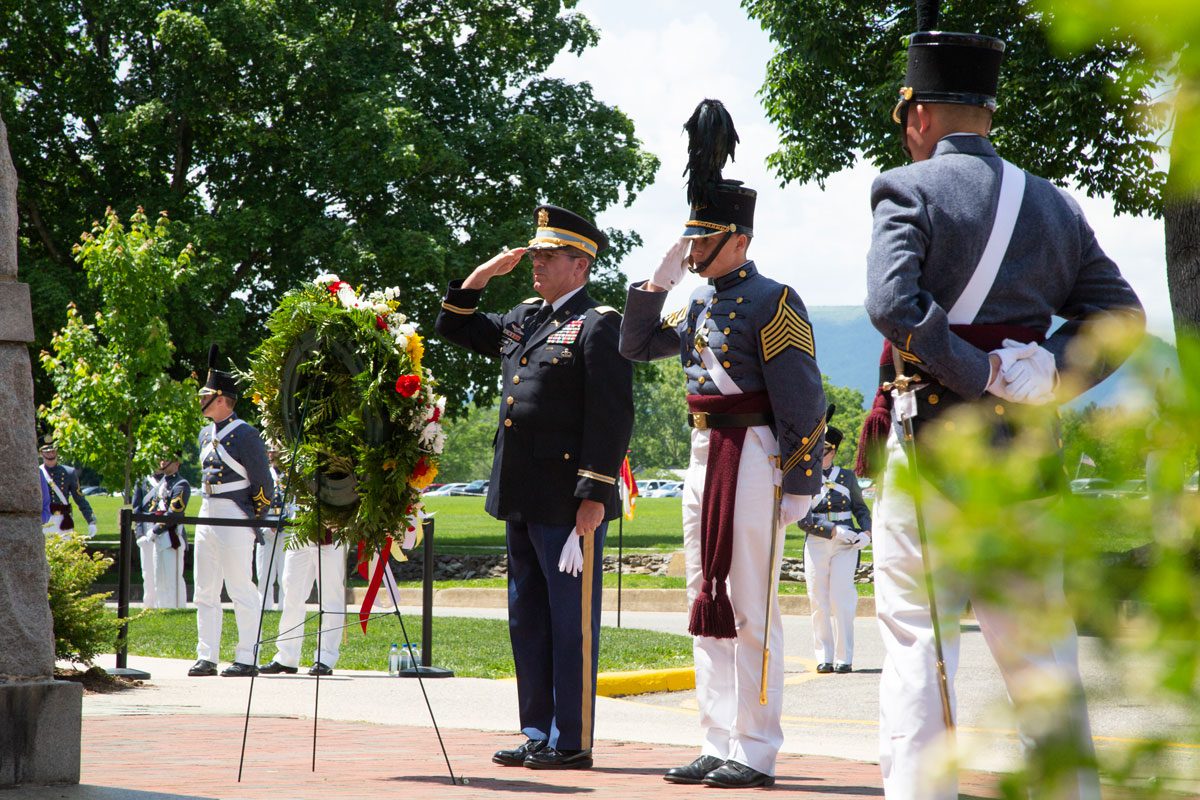 cadet and Col. Wanovich saluting