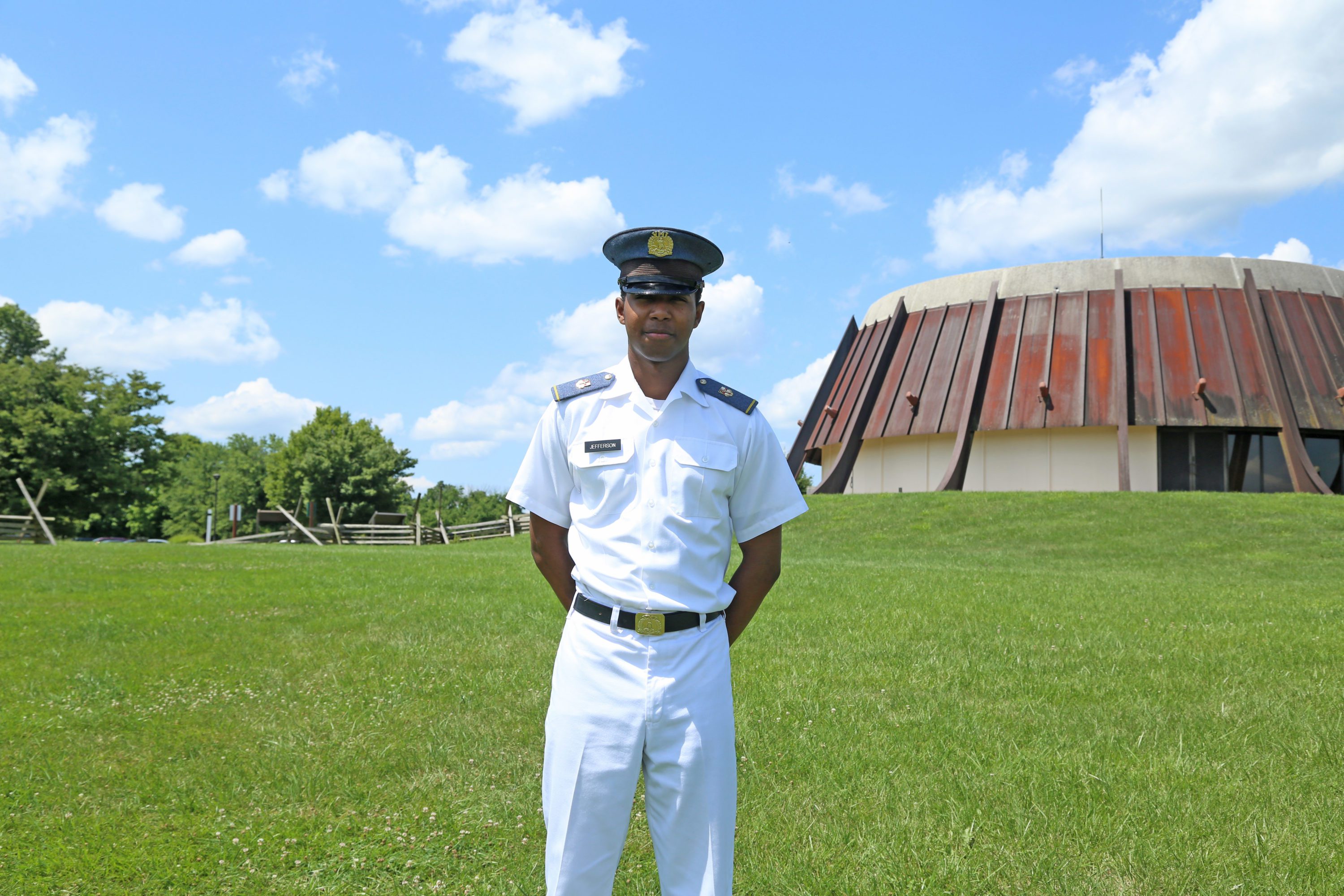 LeAndrew Jefferson '21 in uniform posing with hands behind his back