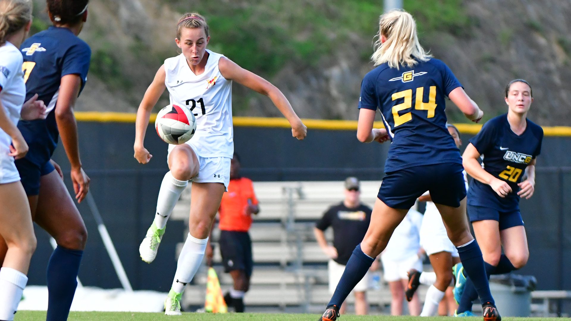 women's soccer players mid-game