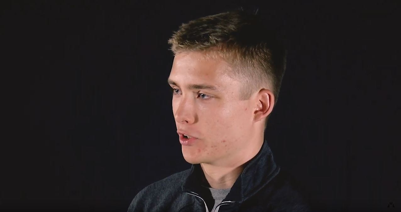 male rifle team member mid-interview
