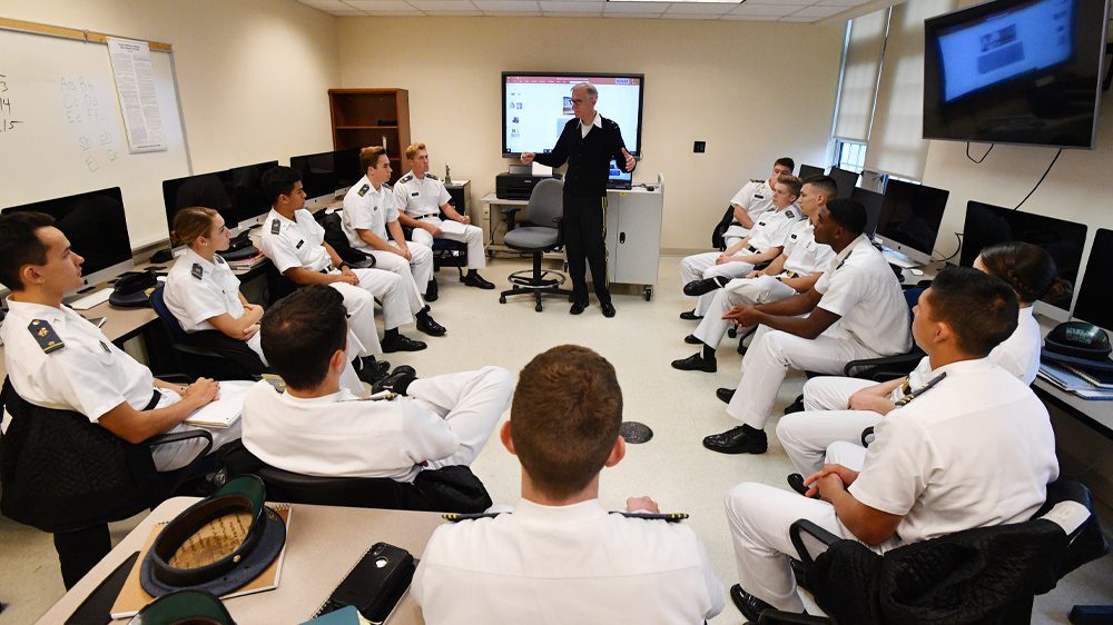 professor addresses group of cadets