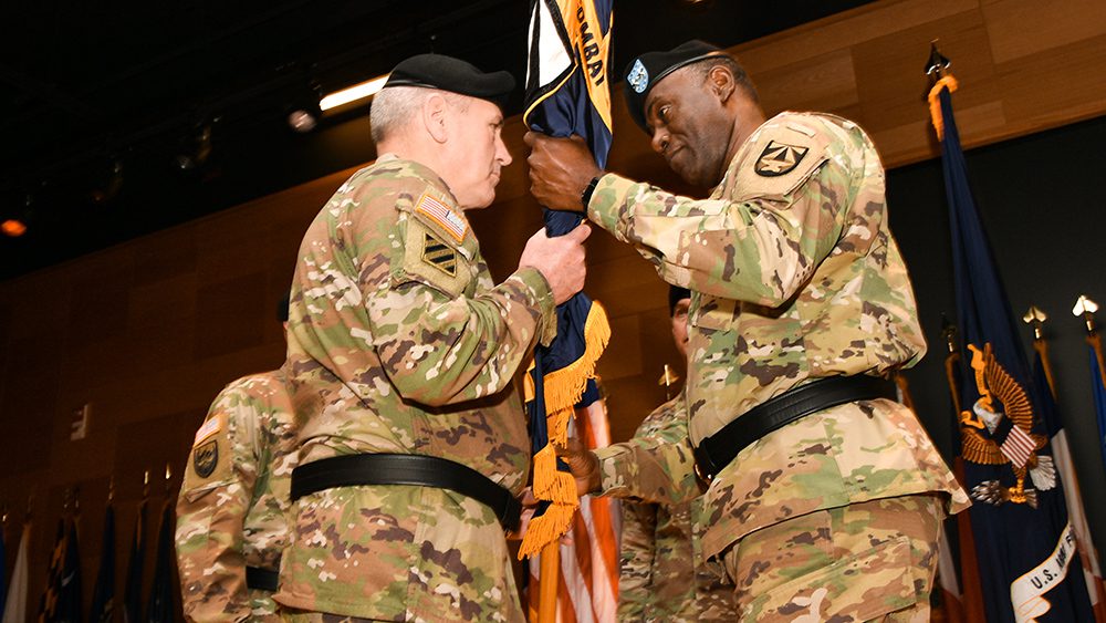 Maj. Gen. Cedric Wins ’85 relinquishing command of CCDC with the ceremonial passing of the command colors to Gen. John Murray, commanding general of Army Futures Command