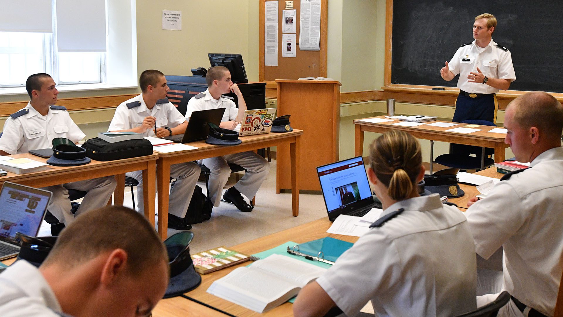cadets in class being instructed by professor
