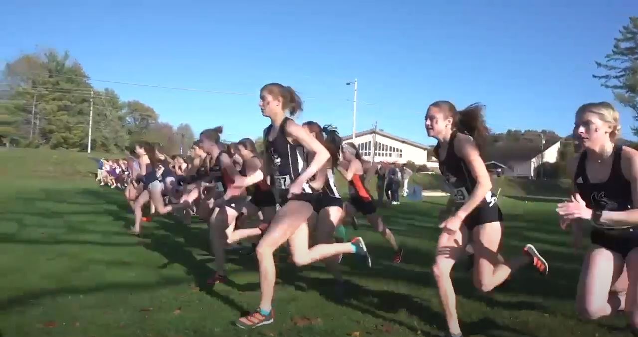 track and field athletes running outside