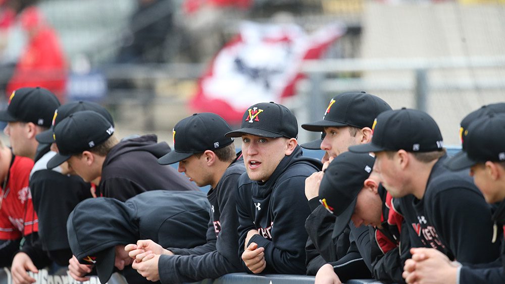 baseball players sitting together