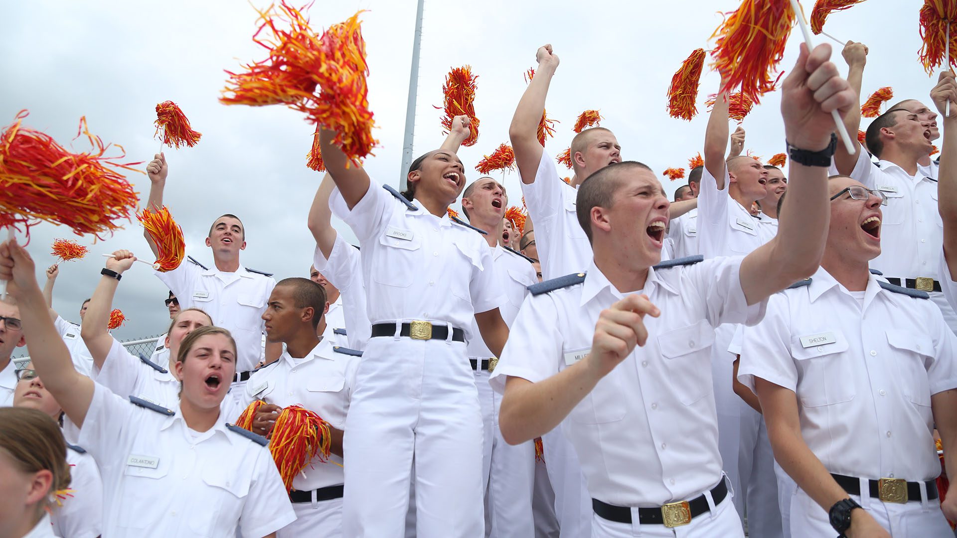 cadets cheering at football game