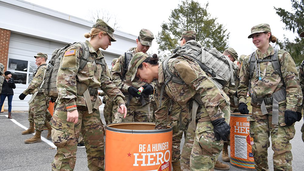 cadets in OCP looking in a bin marked 