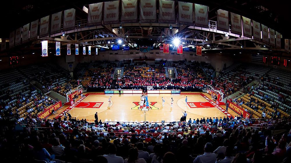 aerial shot of basketball court and full stadium