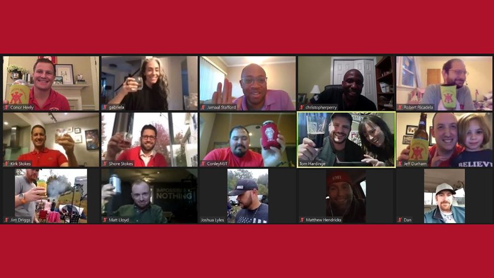 screenshot of alumni from Class of 2005 smiling and toasting on a Zoom call