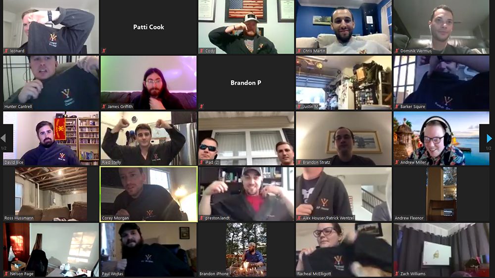screenshot of alumni from Class of 2010 on a Zoom call, posing with their VMI robes