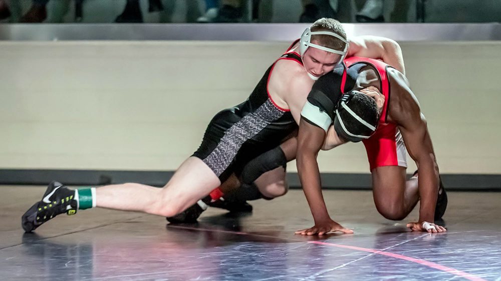 two wrestlers in a match