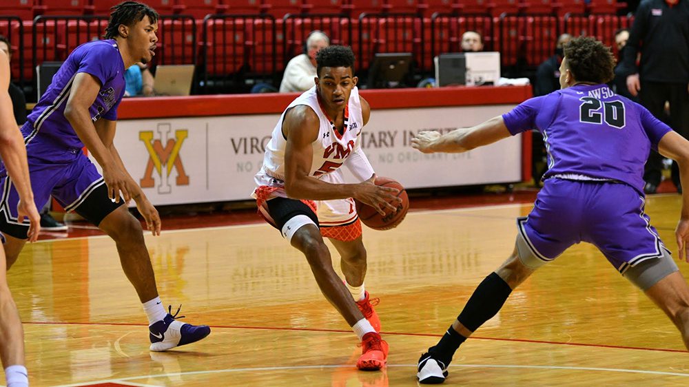 basketball player dribbling ball