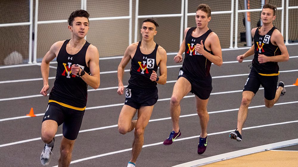 track athletes running on indoor track