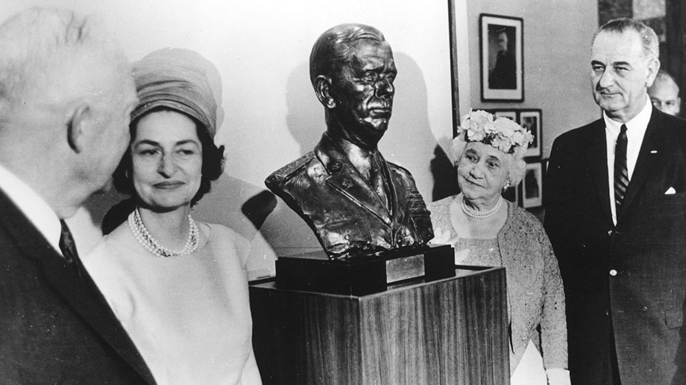 President Eisenhower with bust of George C. Marshall