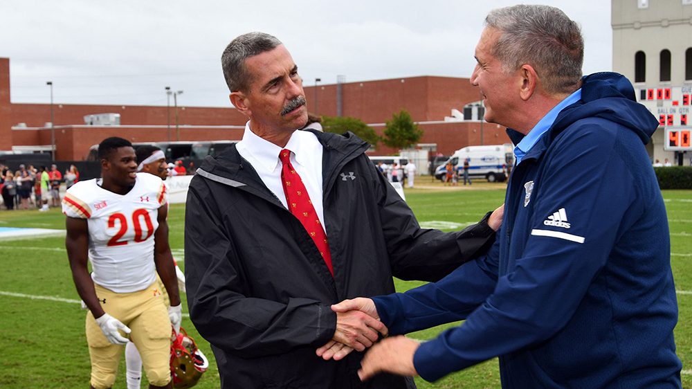 two men shaking hands