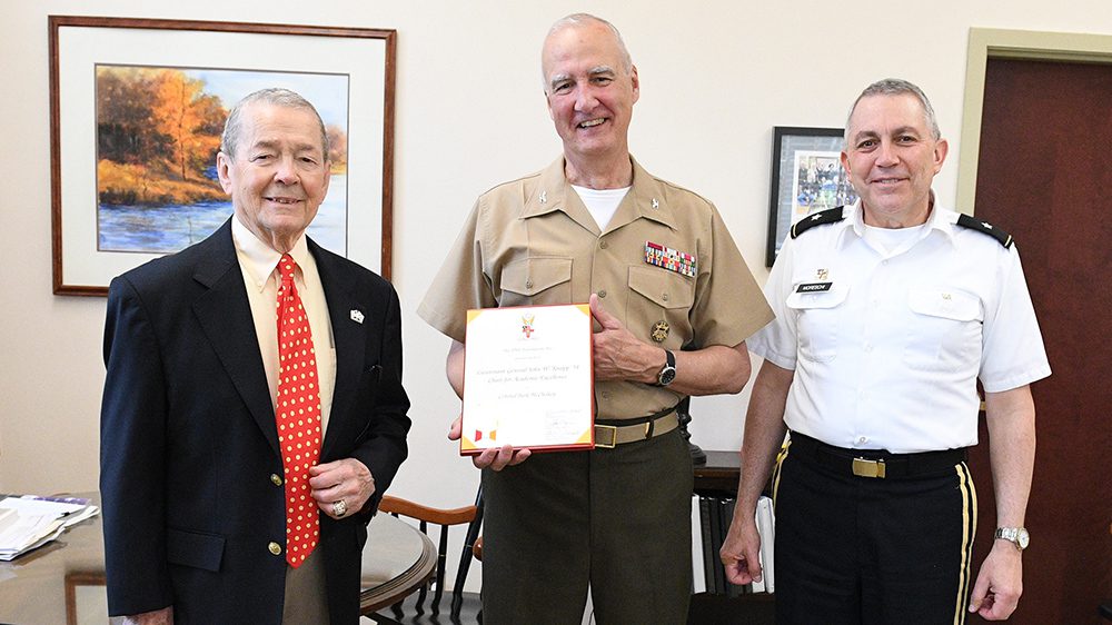 three men smiling