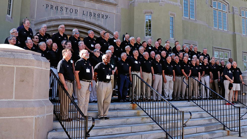 Members of the Class of 1975 stand on the steps of Preston Library to pose for their reunion class picture.