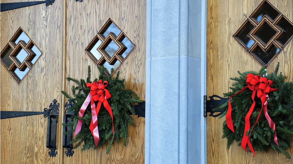 holiday wreaths on outside of doors