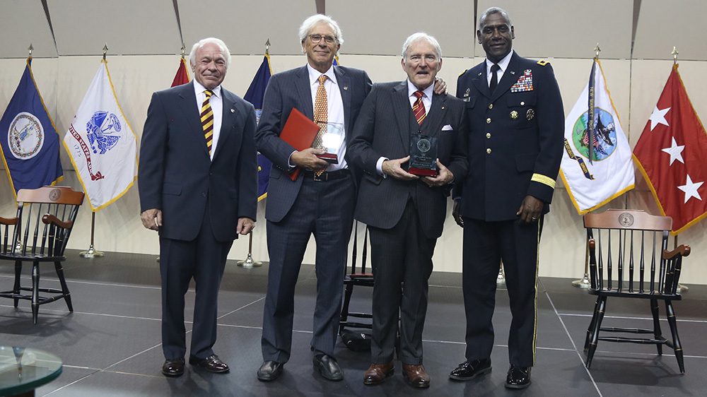 Distinguished Service Award winners pose with Maj. Gen. Cedric Wins '85 and Tom Zarges '70