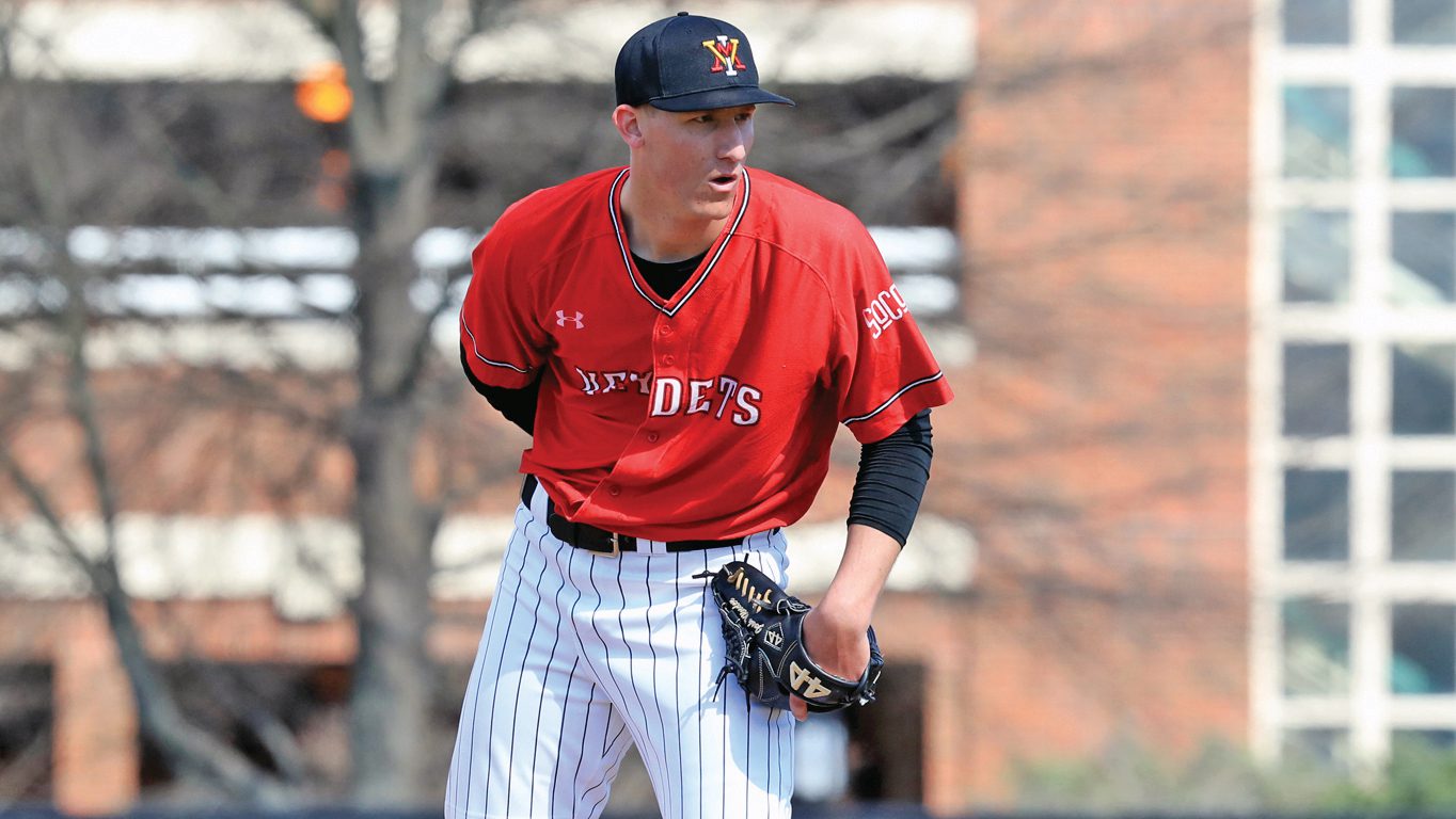 Josh Winder preparing to pitch a baseball.