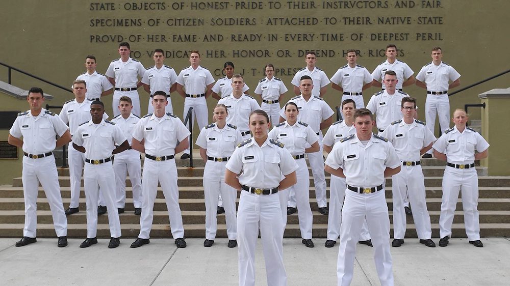 2022 regimental staff standing in front of parapet