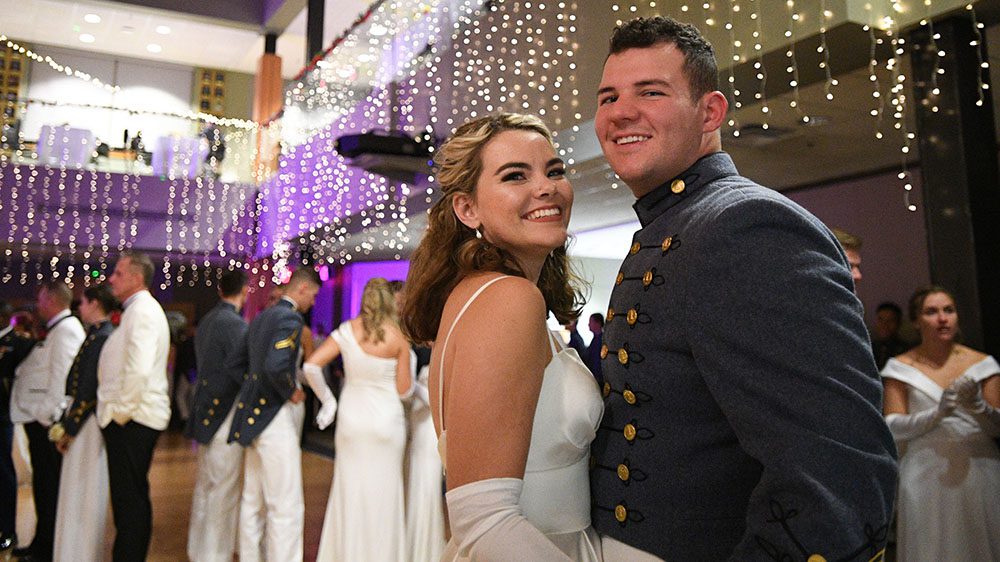 Male cadet and Ring Figure date smiling