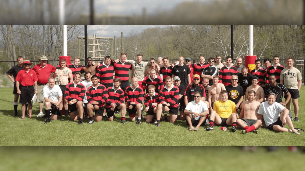rugby team posing together