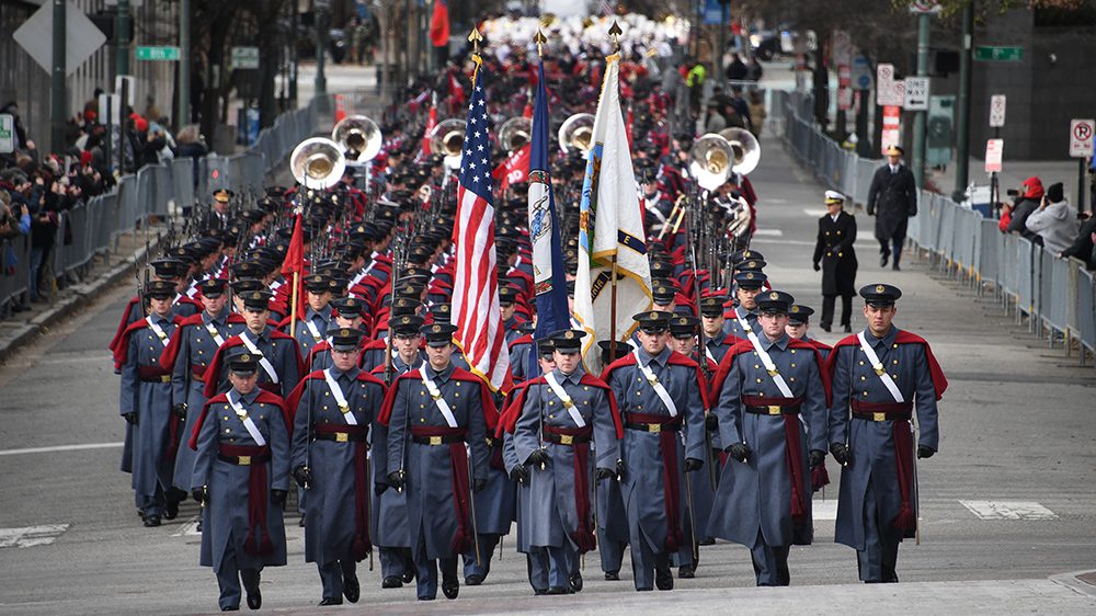 VMI Corps of Cadets marching down the street