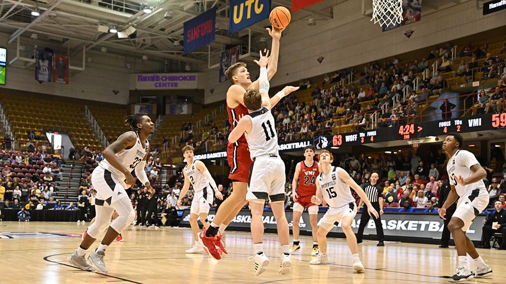 Jake Stephens shooting a basket