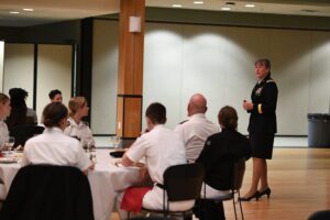 Maj. Gen. Marti Bissell speaking to cadets, faculty, staff, and other guests in Marshall Hall.