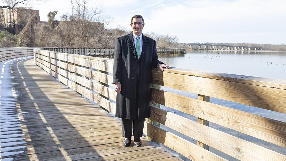 Johnny Partin '14 posing on bridge.