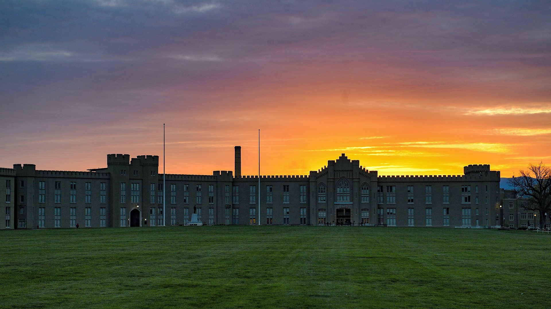 sun rising behind barracks