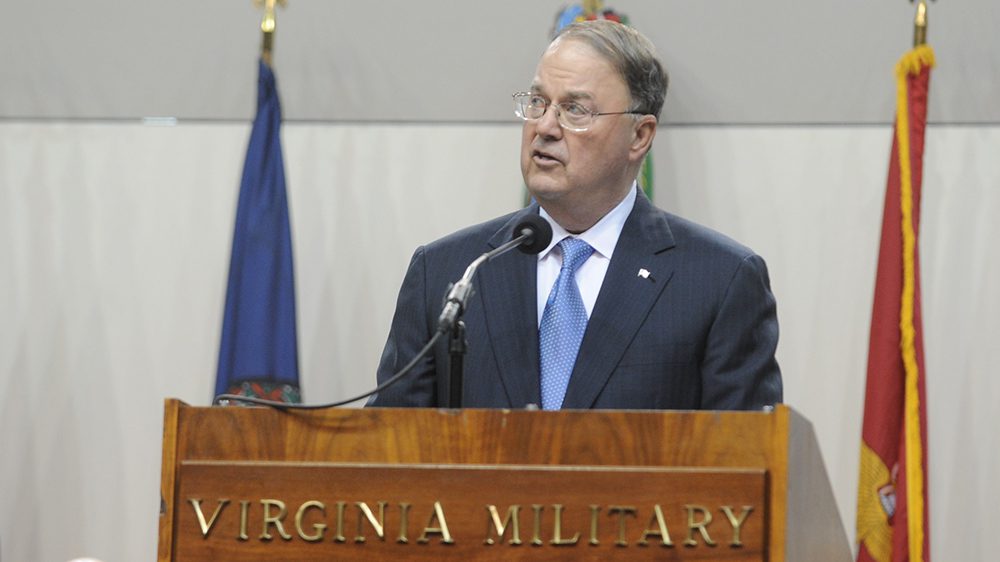 John C. Allen '62 speaking from podium.