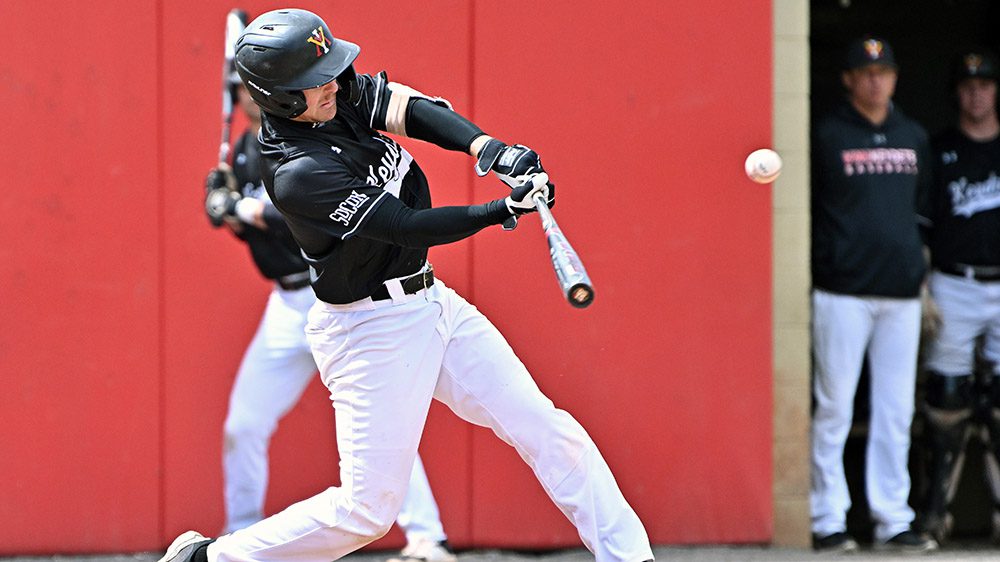 baseball player swinging a bat