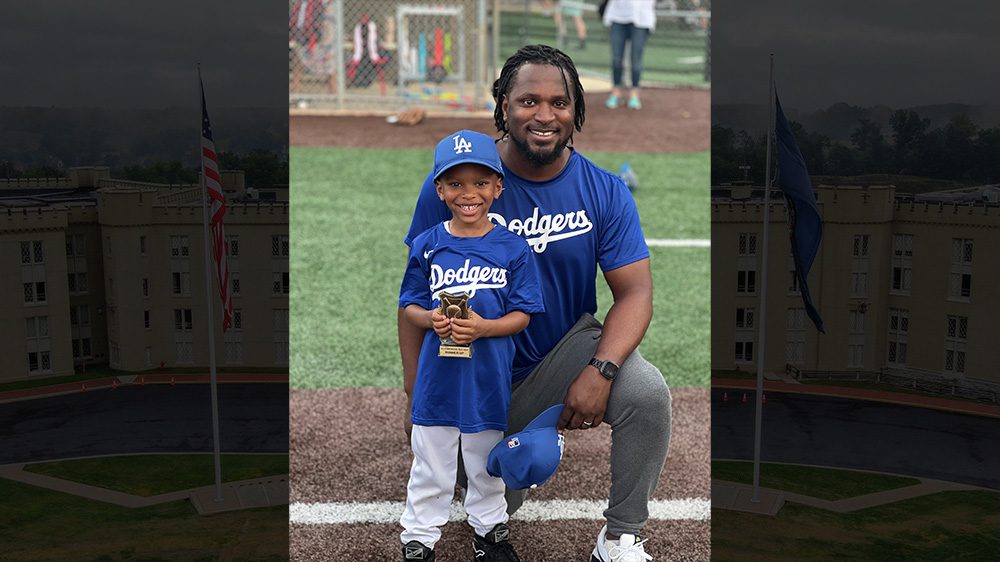 Anthony Oliver ’06 with his son, AJ
